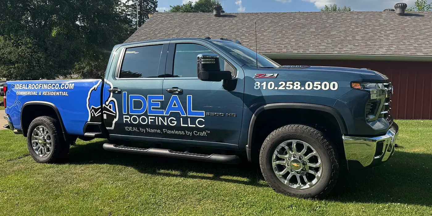 Ideal roofing company truck with logo and phone number so customers know how to contact us.