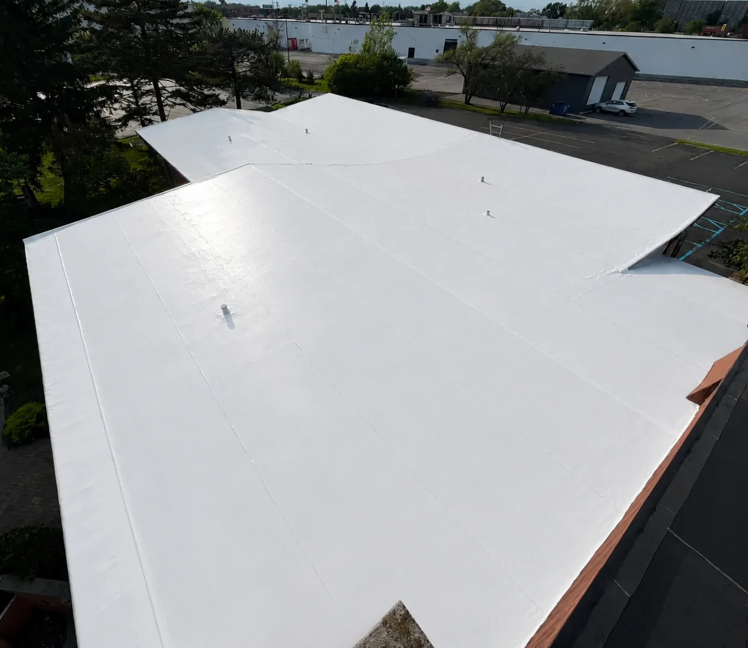 new installation of a white duro last PVC roof on church in flint michigan.