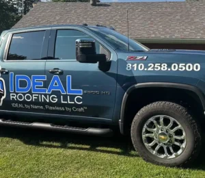 Ideal Roofing company truck show roofing company logo.