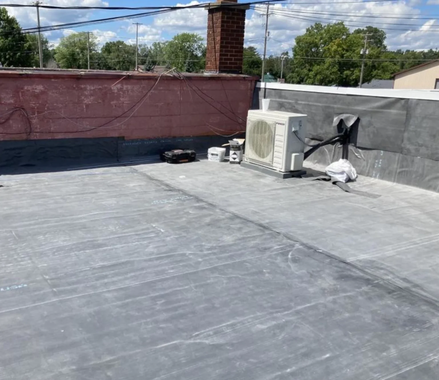 new roof installation on a clio michigan commercial building.