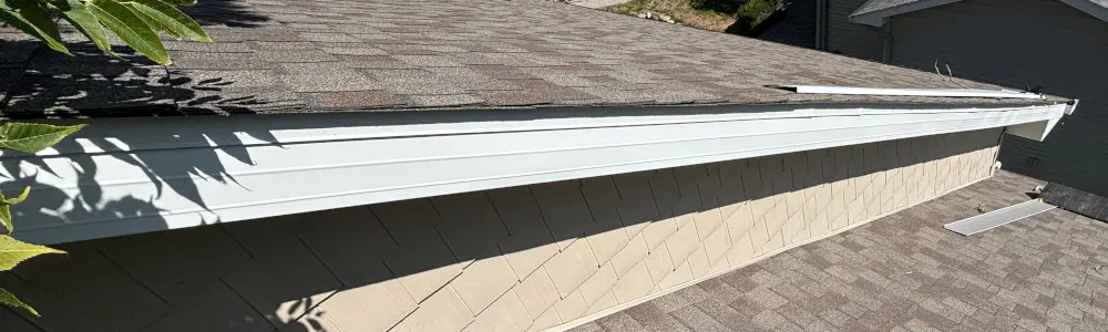 A replaced section of facia metal that was blown of during storm that many homeowners in flint experience during the harsh weather.